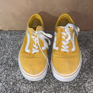 Yellow and white vans.